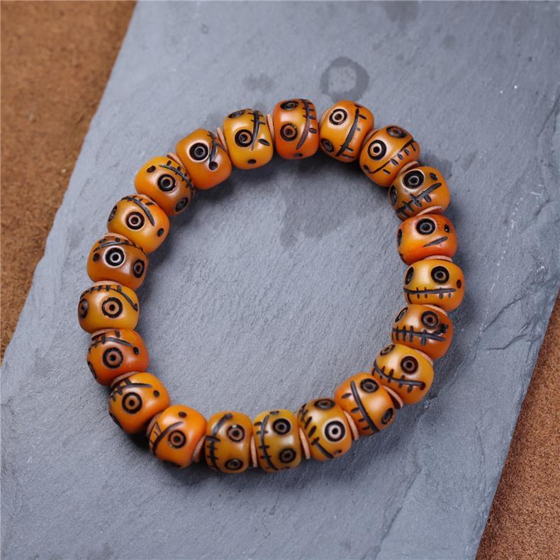Tibetan Yak Bone Carved Smiley Bracelet – Handcrafted Yellow God of Wealth Mala for Blessing & Collection - Buddhabelief