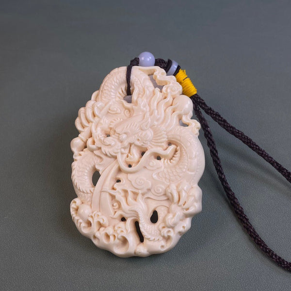 Hand-Carved Tagua Nut Dragon Amulet – Chinese Zodiac Art