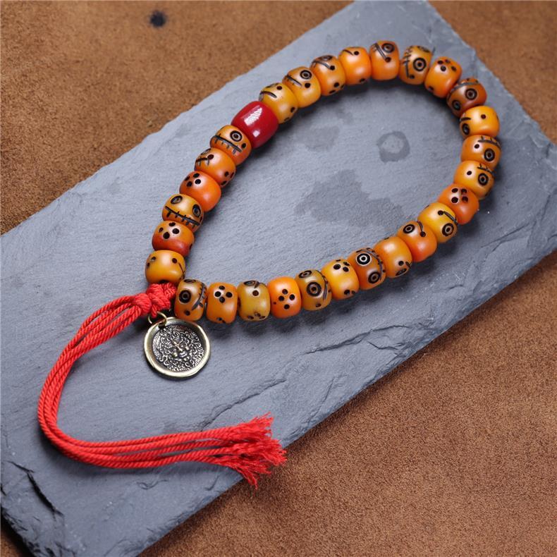 Tibetan Yak Bone Carved Smiley Bracelet – Handcrafted Yellow God of Wealth Mala for Blessing & Collection - Buddhabelief