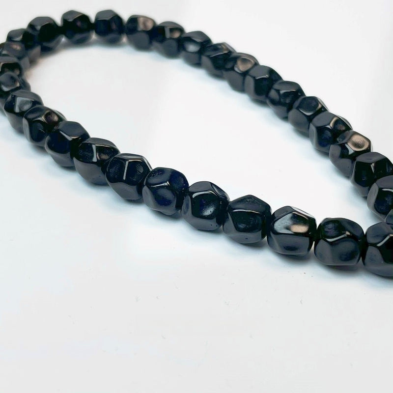 Chocolate Bracelet | Vajra Collection, a fully hand - carved chocolate and black gold coconut palm bracelet - Buddhabelief