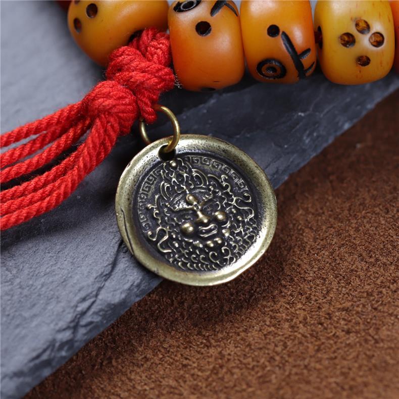 Tibetan Yak Bone Carved Smiley Bracelet – Handcrafted Yellow God of Wealth Mala for Blessing & Collection - Buddhabelief
