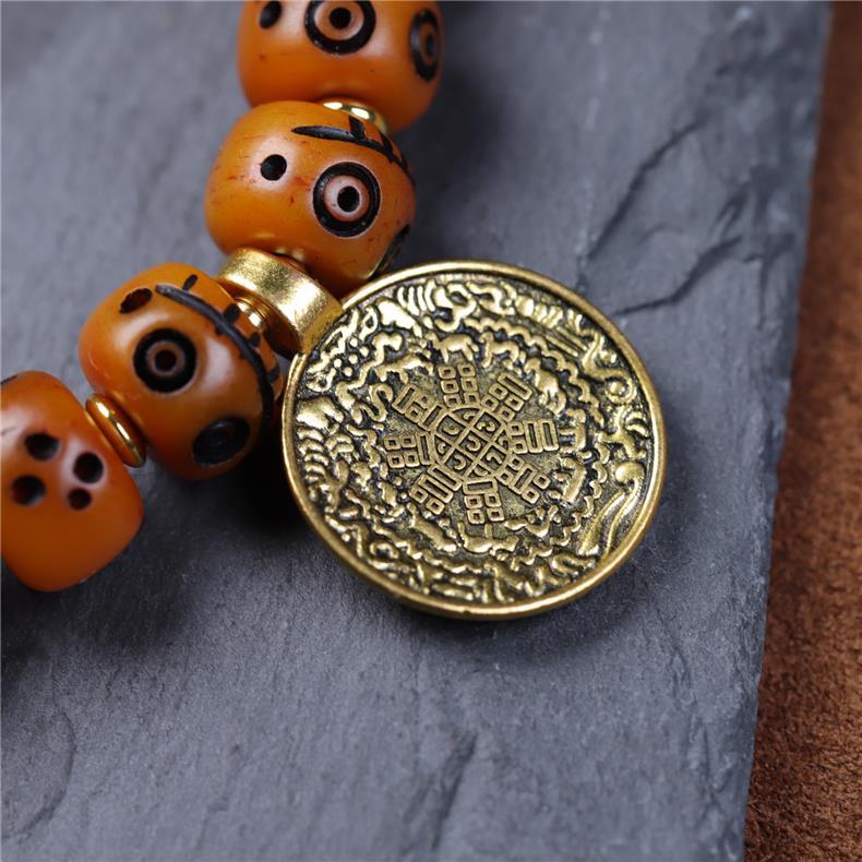Tibetan Yak Bone Carved Smiley Bracelet – Handcrafted Yellow God of Wealth Mala for Blessing & Collection - Buddhabelief