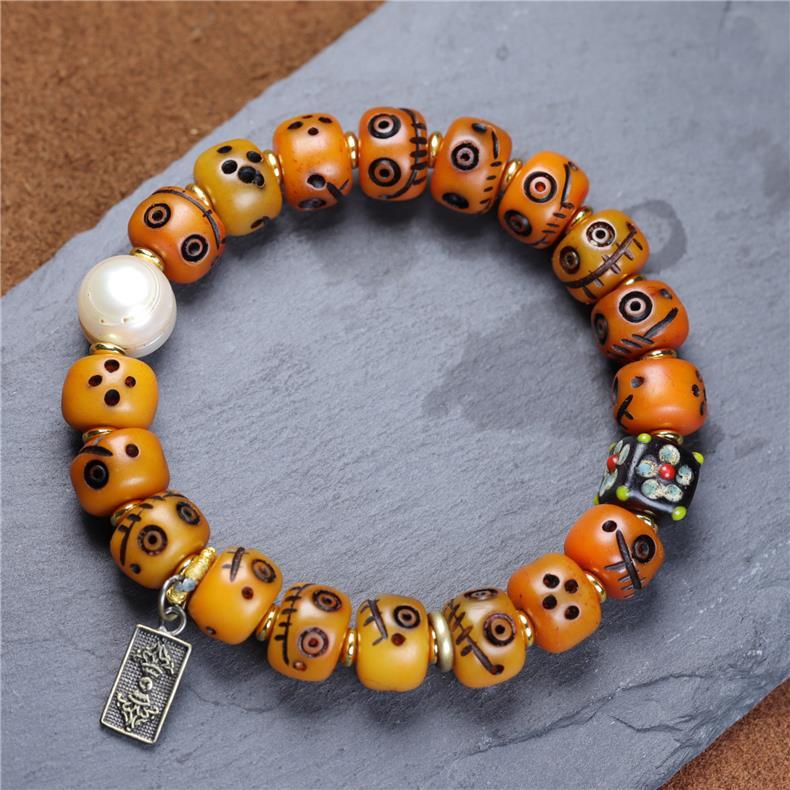 Tibetan Yak Bone Carved Smiley Bracelet – Handcrafted Yellow God of Wealth Mala for Blessing & Collection - Buddhabelief