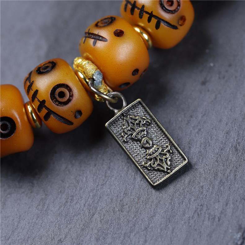 Tibetan Yak Bone Carved Smiley Bracelet – Handcrafted Yellow God of Wealth Mala for Blessing & Collection - Buddhabelief