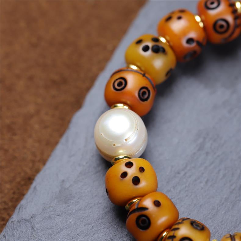 Tibetan Yak Bone Carved Smiley Bracelet – Handcrafted Yellow God of Wealth Mala for Blessing & Collection - Buddhabelief