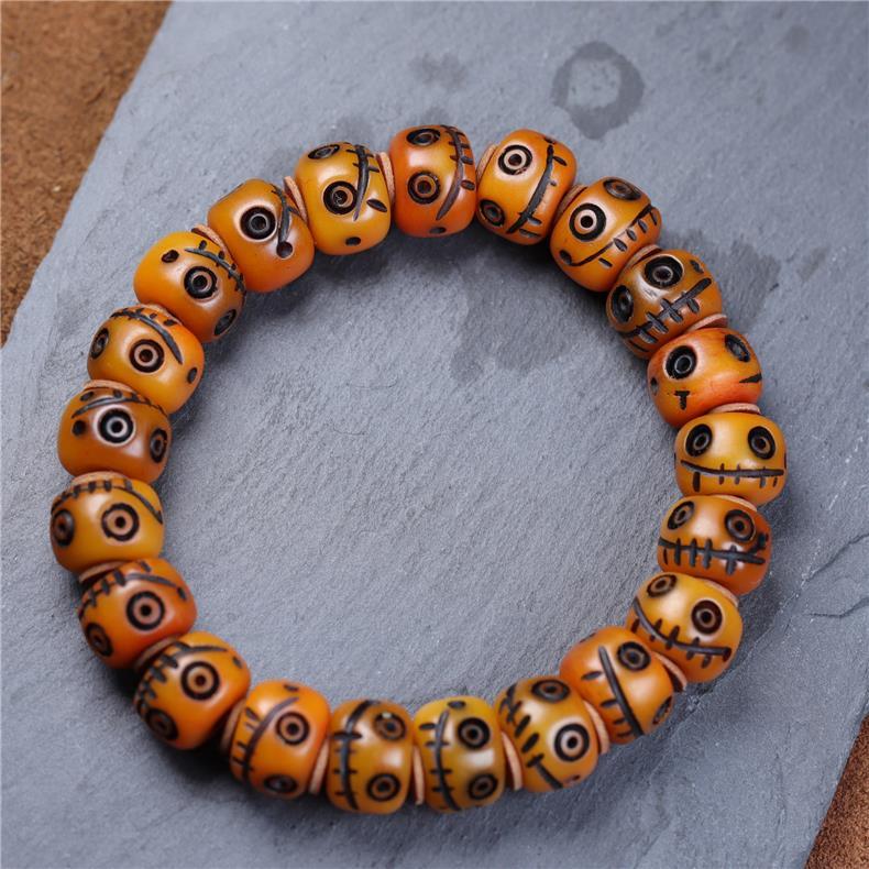 Tibetan Yak Bone Carved Smiley Bracelet – Handcrafted Yellow God of Wealth Mala for Blessing & Collection - Buddhabelief