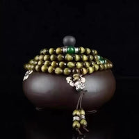 Golden Phoebe Nanmu 108‑Bead Mala Bracelet