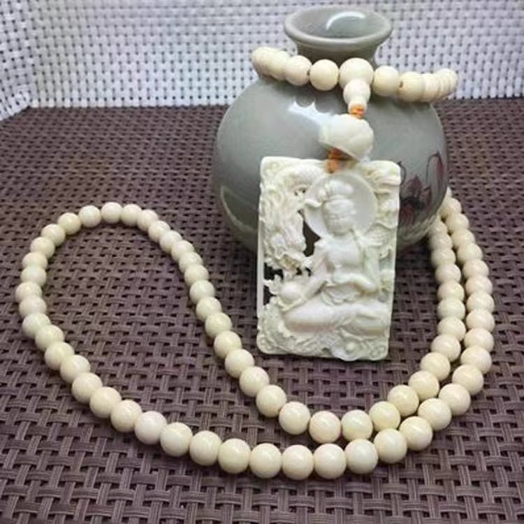 Tagua Nut Dragon‑Wrapped Guanyin Statue - view 1