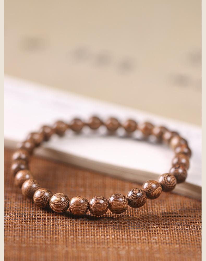 Alternative view of round golden-grain wood beads